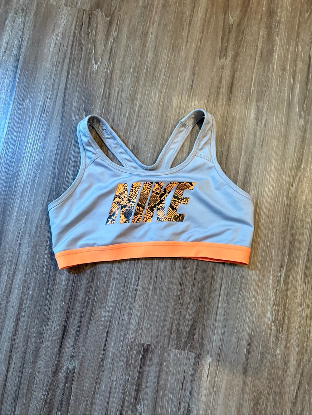 Nike Light Gray Sports Bra with Orange Band and Patterned Logo